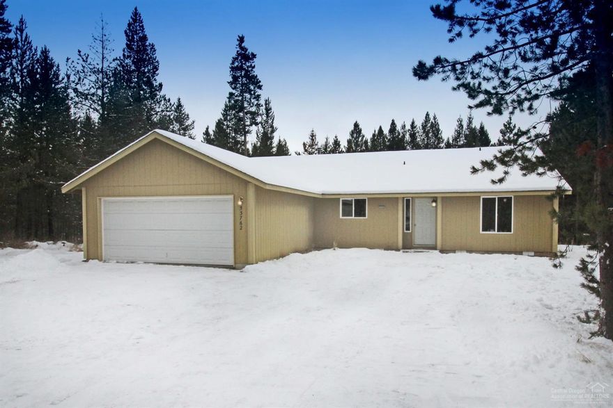 Priced to sell. Very rare Riverfront property at an affordable price for an updated 2003 stick built home on a large 3.65 acre lot. Fishing, tubing, kayaking right from your own back yard! Open floor plan and a huge dining bar connecting the kitchen to the main living space, a big utility/laundry room and double attached garage with, work bench and storage closet. Updated ceramic wood-look floors throughout. Updated cabinets, baths & counter tops. Close to golf. Location is great for access to La Pine, Sunriver and less of a drive to Bend than if you were further south toward more La Pine addresses. La Pine State Park is just a short drive away. Yes, you will need to get your own appliances, but at this value for this area on the river...bring your own or buy new ones. Kinetico water treatment systems. American Home Shield Plus home warranty is included with additional coverage for well pump and septic ejector pump.