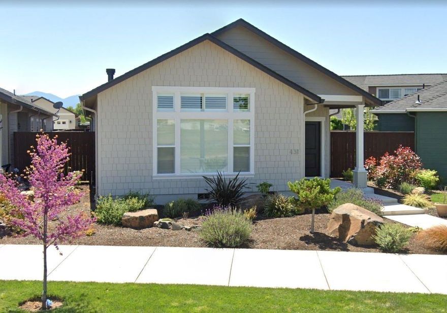 Lightly lived-in, like new home! The Snowy Butte Station popular floor plan, only bigger as this one is one of the rare stand-alone homes! Vaulted ceiling and tile-surrounded gas fireplace in the spacious great room. Transom windows in the front. Granite counters, tiled backsplashes, stained cabinetry with Lazy Susan corner and pull-out spice rack, and stainless steel appliances in the kitchen (microwave is newer). Huge walk-in pantry. Walk-in closet and double sinks in the master. Hardwood, carpet, and tiled flooring. Beautiful plantation shutters throughout. Just a miniscule step into the oversized, finished, two-car garage with utility sink. Covered patio and fenced side yard. Low homeowners' dues cover the front landscaping and pocket park. Close to downtown, Rogue Creamery, and Lillie Belle Farms Chocolates!