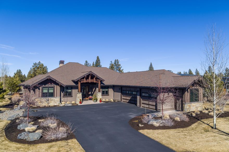 Rare find in Tetherow, one of Bend's premiere golf communities. The heart of the home is the great room with a soaring living room ceiling , massive beams and a floor to ceiling stone fireplace, this single level home doesn't disappoint. This three bedroom three full bathroom home has great separation.  On one side of the home you will find the two spacious guest bedrooms both with walk in closets and full bathrooms. On the other side you will find the Primary suite. This suite has an 8 foot sliding door that leads out to a private patio space. The primary bathroom includes a soaking tub, walk in shower, dual vanities, and a walk in closet. Also on this wing of the home you will find the laundry/mud room and an office. Enjoy the cool nights around the firepit overlooking the 13th fairway and the lush landscaping. The .46 acre lot, has an abundance of outdoor living space.