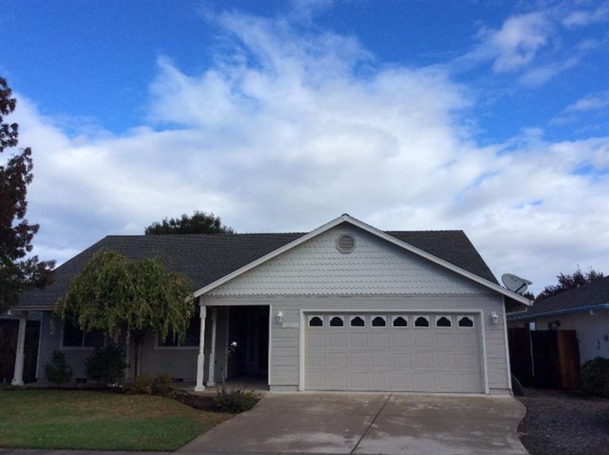 Great West Medford location. Open floor plan with tiled entry. Kitchen has breakfast bar area and dining area leads to covered patio. Kitchen includes range/oven, microwave and dishwasher. Split floor plan with 3 bedrooms and 2 baths. Master leads to back yard. 2 car garage with plenty of storage. Rear yard has storage unit and mature grape vines.