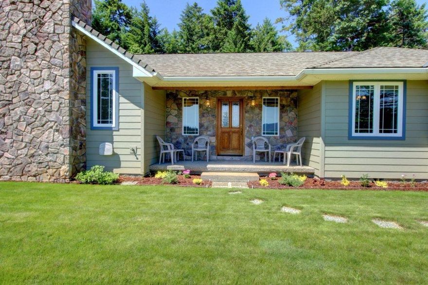 This well-conceived custom home invites you to relax and enjoy its most stunning feature spectacular view across the valley to Sexton Mountain and Granite Hill. Sit on the front porch and enjoy your beverage of choice as you absorb the quiet peace of your mountaintop retreat, surrounded by towering evergreens. The kitchen is part of the family room, allowing the kitchen's occupants to enjoy group conversations and stellar views. Of special note is the endless pool, located off the master suite, for year round swim workouts, a geothermal heating system and an indoor air quality system.