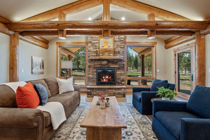 NEW PRICE! Make Sisters your home base with this custom log-accent retreat on 2.07 acres, just minutes from downtown. Built in 2022, this single-level home features 3 beds and 3 baths (1 bath in shop.) Move right in and enjoy vaulted ceilings, hickory hardwood floors, and a chef's kitchen with butler's pantry. Retreat to the spa-like primary suite with a private deck, walk-in closet, radiant-heated bathroom floors, soaking tub, and tiled shower. Attached 3-car garage with EV charging PLUS a 30x17 shop w/ RV parking, flex studio/room, and full bath- endless options for hobbies, studio, or a dedicated workspace. Defensible space is established and yard is prepped for a future sprinkler/drip system, and a back-up ''dual-fuel'' generator capability adds peace of mind. Whether relocating, downsizing, or seeking a Central Oregon basecamp, this property offers the lifestyle you've been searching for—luxury, flexibility, and privacy less than 7 miles from Sisters, Oregon.