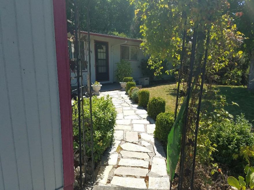 A Southwest Medford gem! 1540 sq ft 3bd /2ba with a brand new roof. Solar electric. Large living room with fireplace insert. Formal dining room with a large kitchen and dining area. Attached shop and 2 car garage for crafts and projects. An additional 12 x 16 backyard shop/storage next to a 8 x 10 metal landscaping shed. Front yard pond and irrigation for the large back yard from a 12 foot well with electric pump. 2 apple trees raised garden beds, a 10 x 10 sun room and a raised deck and patio off the master bedroom.