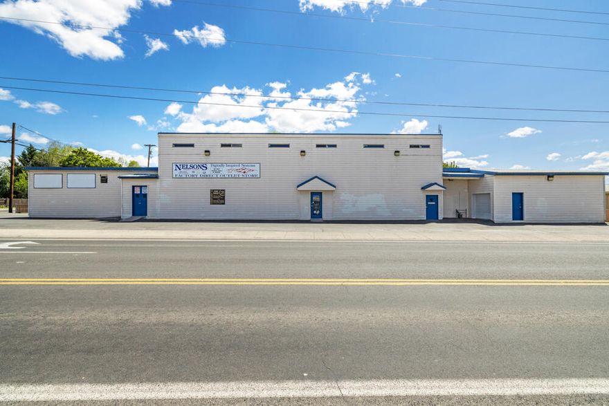 This huge 2 story commercial building is located on a busy corner intersection with a signal light in Klamath Falls. Has been remodeled in 2006 with all high energy efficiency in mind with all LED lighting inside and out. Roof would accept solar panels, electrical system was all upgraded, metal roof, concrete flooring, central air, and natural gas heat. Fire-resistant exterior with concrete based hardie board. 4 main solid steel commercial entry doors. Tons of storage and many possibilities of so many multiple business types, storage hub for supply chain, deliveries, showroom, separate offices to rent out, gym and so much more! Seller will consider Owner Carry with right terms.