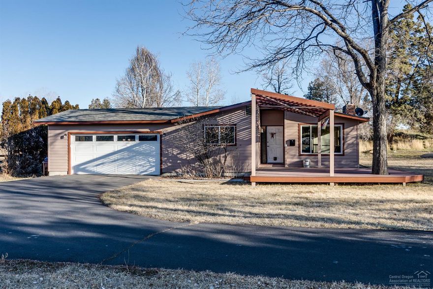 This single level small acreage property sits in the urban holding area within the UGB of Redmond. It is fenced and cross-fenced, on a well, with an irrigation pond and 2 acres of irrigation rights. Some in-ground irrigation spigots are installed, new irrigation pump installed in the past two years. House has brand new heat pump and roof installed in the last five years. All laminate flooring and lovely, practical floor plan with two master suites on each end of the house. This property encompasses the reasons you want to live in Central Oregon-- to enjoy some space and privacy, store your toys and gear, and be close to all of the recreational opportunities that abound. <br>