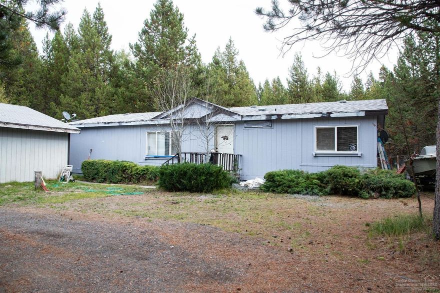 Investment property with detached garage on half an acre in OWW. Across the street from DeschutesRiver and close to all outdoor recreation Central Oregon has to offer. Nice neighborhood, HOW covers private community boat launch. As-Is, priced purposefully to reflect repairs needed, great flip opportunity, ready for some TLC.