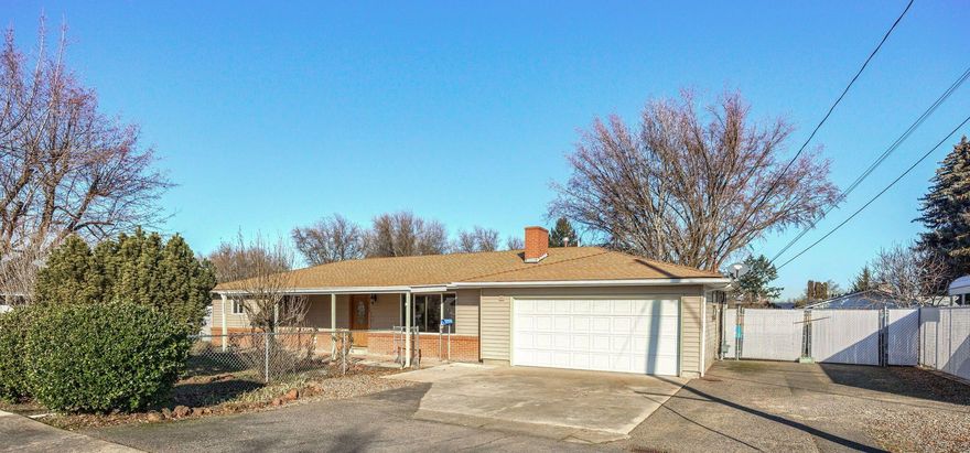 One owner custom home, located in great northwest Medford neighborhood.  Spacious .31 acre lot, fully fenced with RV parking and potential for an ADU or shop.  Single level home with solid oak & laminate floors, expansive living room with rock fireplace & Granite hearth, formal dining & breakfast bar.  The galley kitchen offers wood cabinets w/slab Granite counters, glass cooktop and wall oven.  Large utility room w/utility sink, newer handicap friendly bath with walkout shower and the guest bath offers soaking tub and single vanity w/cultured marble. All good sized bedrooms w/hardwood floors under carpets, den/office or 4th bedroom w/separate access, all thermo windows and new natural gas HVAC & hot water heater in 2022. The large covered wood deck offers great privacy, 2-car attached garage, metal siding with brick accent, mature landscaping, city services, covered front porch and the potential for all your toys and/or hobbies.  Not to be missed!