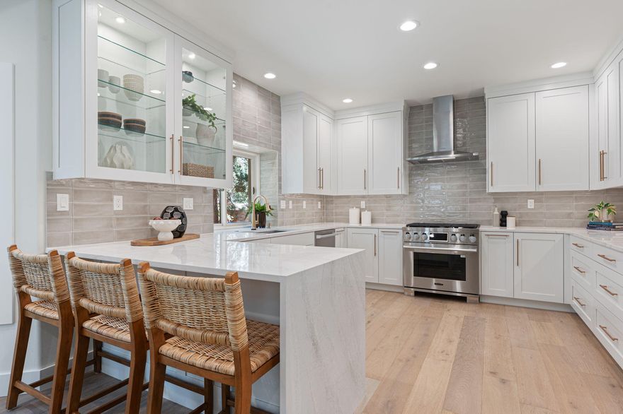 Tucked in a quiet cul-de-sac in Bend's premier Broken Top Golf Community, this fully remodeled, single-level home sits on a private, wooded .69-acre lot. With 3 beds, 2.5 baths, it features white oak  wood flooring, LED lighting, a whole house water filtration system, and an open great room with vaulted ceilings & a full-height wood-burning fireplace w/gas starter. The chef's kitchen is pure luxury with custom cabinetry, quartzite countertops, Signature SS appliances, & an eating bar. The primary suite offers a double vanity, tiled shower, soaking tub, walk-in closet & deck access. Enjoy year-round outdoor living with wrap-around covered decks nestled in a tranquil natural setting. The 1,152 sq ft triple garage includes three 10-ft doors—perfect for all your Central Oregon gear. Enjoy clubhouse dining, playground, bike/walking paths, & a staffed, gated entrance. Join the club for access to the 18-hole championship golf course—Central Oregon living at its finest!