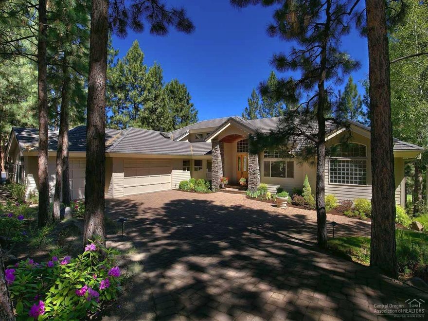 Looking for a home that has it all? This expansive home boasts casual elegance and the special features you would expect in a Norman Building custom home. The master is on the main level, and with the gourmet kitchen, office and guest suite, this home can truly live like a single level home with benefits. Downstairs, the family room and four additional bedrooms offer space for the perfect craft room, exercise or flex room. Located on Awbrey Glen's 9th fairway, the .48-acre lot offers incredible privacy.