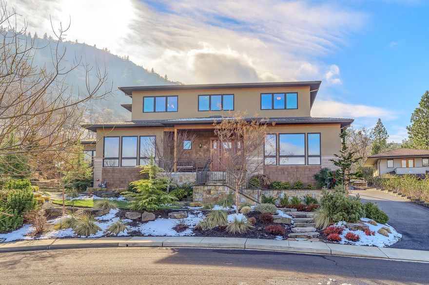 Custom built in 2013 by local quality home builder Steve Asher. 3,668 square feet with generous 10' ceilings on main level and 9' ceilings on the second floor. 3 Bed, 3.5 bath with main level bedroom,  sauna, en-suite and laundry facilities. Gracious living and family rooms, both with gas fireplaces, dynamite kitchen with oversize central island, Thermador appliances and Kraftmaid cabinets. Sierra Pacific wood-clad windows, formal dining room and butler pantry. 2.5 car attached garage with exercise room. Upstairs, two additional bedrooms and study/ media room, two full bathrooms, and additional washer/ dryer. .93-acre lot located in the Strawberry-Hald neighborhood above Lithia Park on a quiet cul-de-sac with expansive views of Grizzly Peak and valley below, adjacent to public land and trailheads. Established landscape
by Sage Hill with outdoor lighting, water features and custom gazebo. Quality built, lovely home in a serene setting with Ashland's many amenities close at hand.