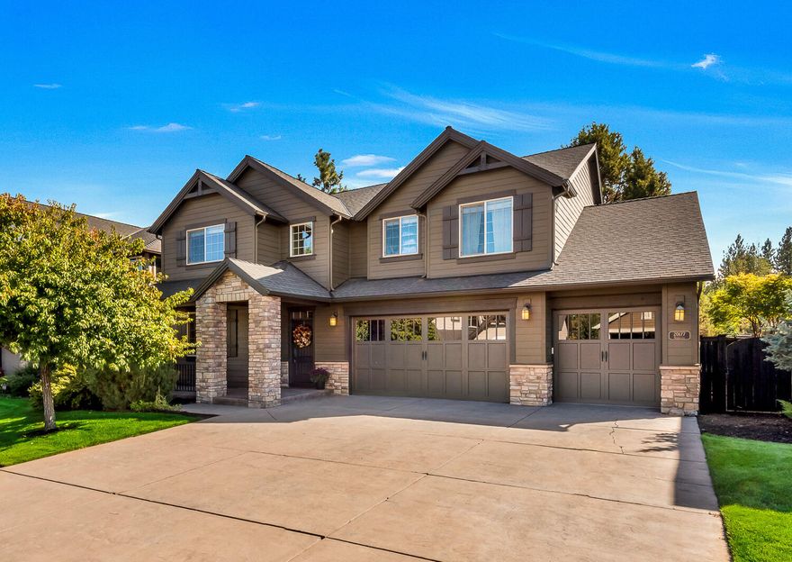 Don't miss this large 4-bedroom family home with office and bonus room located in the desirable Stonegate Neighborhood. This incredible SE Bend craftsman features a spacious open floor plan with a dedicated formal sitting/dining area, living room with gas fireplace, expansive kitchen, and built-in wine bar. The large upstairs primary bedroom has vaulted ceilings, soaking tub, double vanity, and additional space for a 2nd office or workout room. This 4-car garage is what all the Central Oregonians dream about.  Lastly, the backyard is a golfer's paradise.  There are several professionally installed artificial golf greens for the golfing fanatic to work on their short game.  This premier neighborhood is adjacent to Bend Golf & Country Club & features a pool, playground, and walking trails.  Less than 5 miles to downtown Bend. Seller to credit buyer $20,000 towards closing costs, prepaids, or rate buydown.