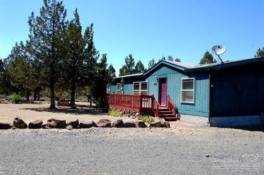 Soothing sauna on Sioux Loop. Immaculate home with lrg detached dbl car garage w/ shop area on almost 2ac. Spacious 3bed 2bath 1904SF MFG home. Living room, family room, lrg open kitchen w/ lots of cabinets & counter space. Plus den/office w/ ceramic tile floors & nice sauna to relax in. Split floor plan, vaulted ceiling & many recent updates. Several storage sheds, nicely fenced & minimal landscaping