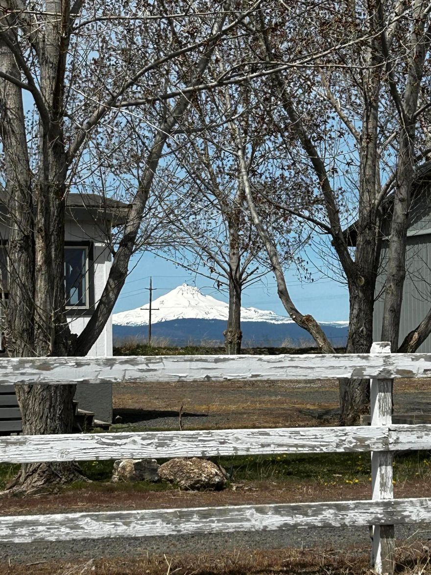 INCREDIBLE MOUNTAIN VIEWS along with AMAZING FARMING OPPORTUNITY! 117.40 acres of agricultural land with rich fertile soil and 116.5 acres of irrigation rights fed from the Senior Deschutes River North Unit and household water from the pristine Opal Springs (some of the purest water in Oregon). Culver is known as the banana belt of Central Oregon, with a robust community of agriculture farms strewn along a stunning backdrop of the Cascade Mountains. This land includes a 1,620 sf 2 bedroom 2 bath manufactured home, and a 840 sf single wide manufactured home used as the office, a nearly 10,000 square foot shop. The property also features electric service supply of 500 amp, 480 volts 3 phase. Both dwellings will need updates and TLC. This is an incredible opportunity and with the correct terms, possible owner carry. There is also an option of taking over the current loan. Reach out for more information.