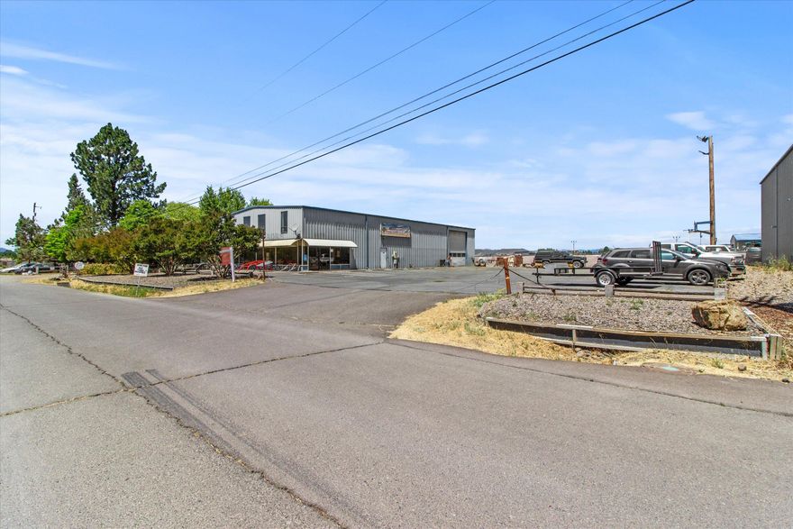 Prime Mixed-Use Property on Crater Lake Hwy!

Welcome to 1055 Dillon Way — a rare opportunity to own a versatile mixed-use property in the heart of Central Point, right off historic Crater Lake Highway. This unique offering includes a spacious 5,000 sq ft commercial warehouse—perfect for contractors, creatives, light manufacturing, storage, or showroom use—and a charming 1,388 sq ft private residence nestled beside it.

Whether you're looking for a live/work setup or seeking dual income potential, this property delivers. The layout allows for privacy and functionality, with separate entrances and ample parking.

Don't miss this chance to invest in one of the area's most flexible and high-visibility locations.