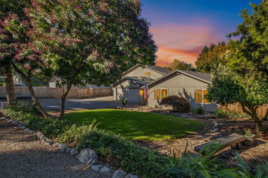 Discover privacy, space, & convenience in this 3 bed, 3 bath home located in desirable SW Tigard! Situated on an oversized & fully fenced 0.54-acre lot, this property offers room to relax, play, & entertain year-round. Enjoy easy access to Hwy 99, I-5, & 217, w/Bridgeport Village, Whole Foods, & more min away! Inside, you'll find generous living areas w/bonus rooms & den, while outside boasts endless possibilities â€” from the massive shop w/bonus room above (perfect for hobbies, workspace, or future ADU potential) to an extra detached garage for storing all your toys/tools. Shop could easily be divided into multiple work areas & ftrs pull-through garage access, abundant workbenches, & tons of parking for RVs, trailers + more. Garden lovers will appreciate the established raspberry, blueberry, & strawberry plants, + private raised garden beds w/automatic drip irrigation. A chicken coop w/a covered run adds to the homestead charm, all set on a quiet, low-traffic street. Don't miss!