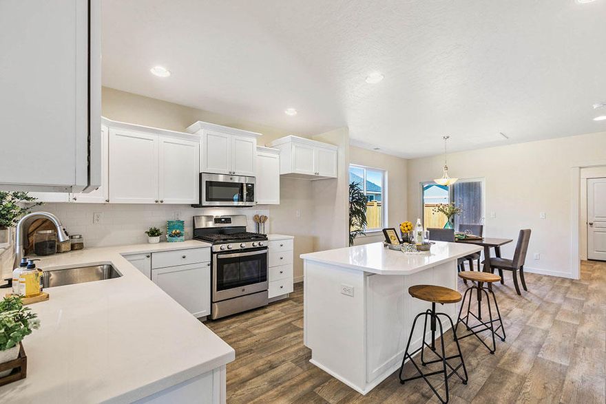 Our newest community, Crossings at Metolius, in SW Redmond offering the Jackson floor plan with our 3-car garage option included!  This single level home includes an incredible open kitchen that provides ample storage space with an island, large pantry and built in desk space.  The living room with corner fireplace and the perfect amount of natural light coming through the front windows really complete the space of this well-rounded home.  The master bedroom is located privately in the back of the home and includes 2 closets along with a tiled shower in the bathroom and dual vanities.  A covered patio off of the dining room is the perfect size for your outdoor living space!  A fully fenced yard is included!  Personalize your interior finishes for this home today!  Estimated completion April/May 2021