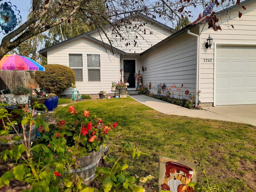 Don't miss out on this beautiful 3 bedrooms and 2 full bath home, that features an open floor plan.  Outside this home, it is fully landscaped with in ground sprinklers and drips.  There is a fenced backyard and an attached 2 car garage that has been completely finished.  2017 new roof installed.  All information deemed accurate but not guaranteed & subject to change at any time.