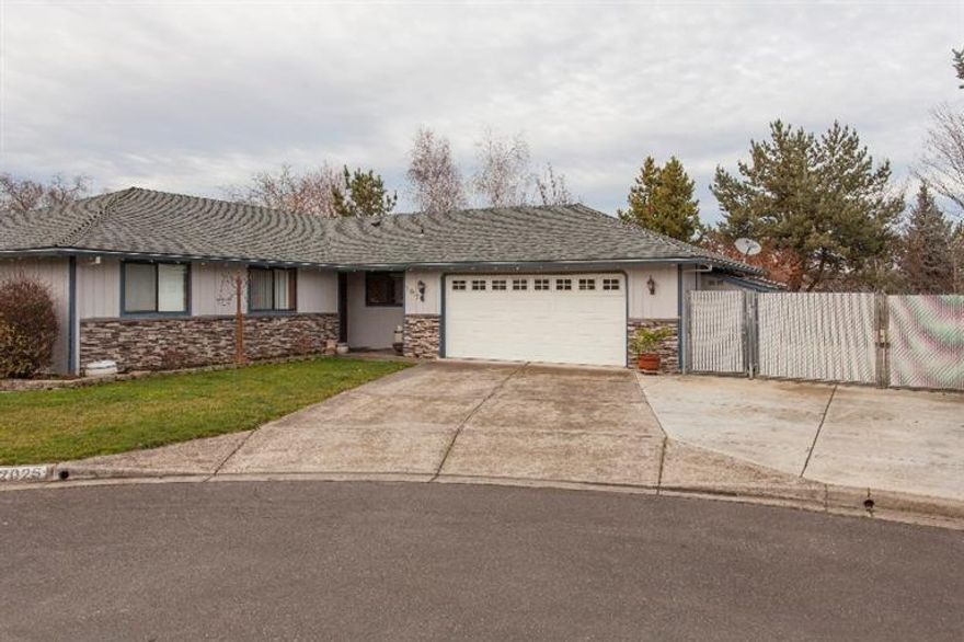 Solid, well-designed & nicely updated E Medford home at the end of a lg cul-de-sac. .22 acre fully fenced & landscaped w/huge 15' x 50' gated RV parking , rm for a shop, oversized side yard, spacious back yard w/patio & hot tub pad/wired, extra 17' x 28' off street parking area in front of RV gate & lg storage shed. N Medford school district in area of newer well-kept homes. Spacious & open great rm design w/gorgeous travertine tile floors in the entry, hall, bathroom, kitchen, dining, & utility rm, coffered ceilings, custom wood burning fireplace & granite counters throughout. Nice custom kitchen w/stainless appliances, granite counters, tile backsplash, breakfast bar, pantry & plenty of counter space. Mstr suite w/coffered ceiling, walk-in closet & master bath w/separate water closet & tile/glass door shower. Light & bright interior w/multiple skylights, patio access from dining area, utility rm, lg 2 car fin garage w/work bench & shelves, newer 40 year comp roof & new 50 gal W/H.