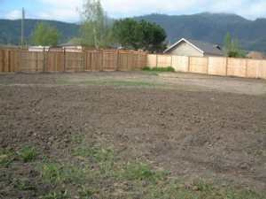 Create Your Own Dream!! Level view Lot in Ashland ready to go! All utilities to the property. This special property is next to a soon to be new city park presently under construction. Access is on Evergreen Lane with newly paved alley. Lot size to be approximately 9067 square feet subject to minor land partition adjustments & filing a final partition map with Jackson County Surveyor. Build your Dream Home Here!