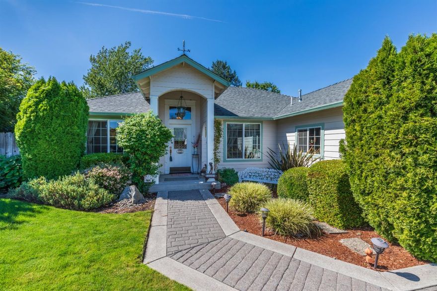 This beautiful home is the very definition of Move-in-Ready''! Immaculate condition both inside and out! Features include: gas fireplace and tray ceilings in the living room, granite counters in the kitchen, pantry, island, beautifully landscaped front and back, cozy covered back patio, room for extra parking next to garage and so much more!