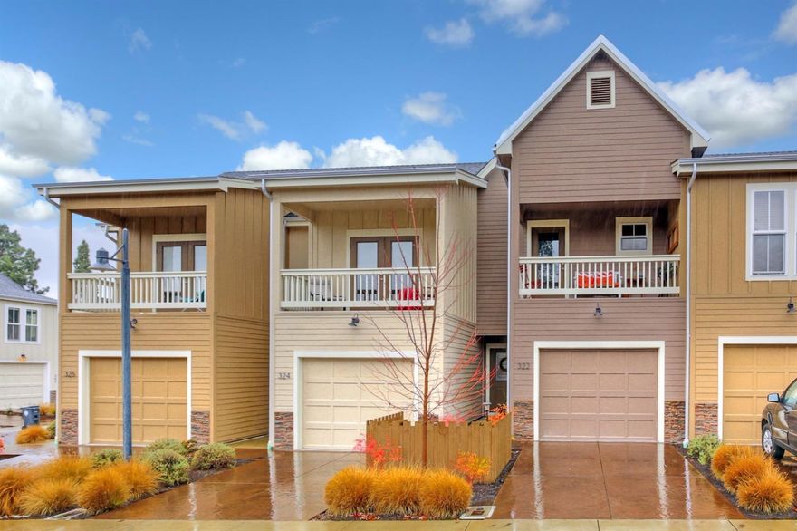 Beautiful, like-new 3 bedroom townhome in The Farms of Jacksonville! Quality built in 2013 to enjoy a low-maintenance life-style. Handscraped finish wood flooring throughout downstairs. Living room open to dining area. Efficient kitchen offers granite counters, eating bar and stainless steel appliances: gas range/oven, microwave hood and dishwasher. Half-bathroom on main level. Upper level bedrooms boast high vaulted ceilings and large picture windows. Master bedroom has walk-in closet and door to balcony with pretty views. Deep laundry closet on upper level convenient to bedrooms. Covered back patio overlooks common area lawn. Single-car garage. Darling community center perfect for large gatherings and events. Minutes away from historic downtown Jacksonville for great dining, boutique shopping and Britt Festival. Woodland trails nearby too!