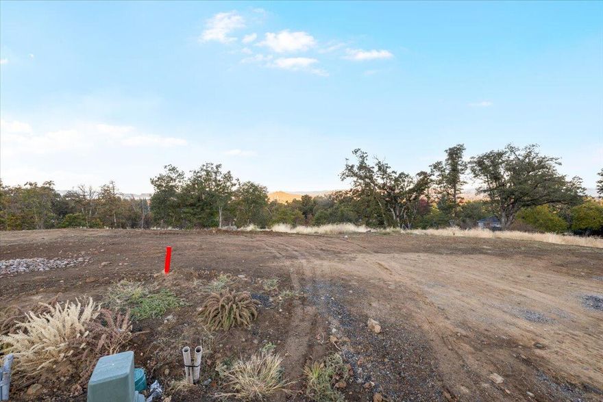 Introducing Quail Run Estates, Eagle Point's premier new subdivision of large luxury estate lots. Discover a rare opportunity to build your dream estate on one of these generous 1-acre view lots, perfectly situated overlooking the renowned Eagle Point Golf Community. These elevated home sites boast breathtaking, panoramic views of the golf course, surrounding mountains, and Rogue Valley. LOT 72