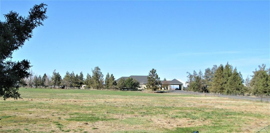 Incredible opportunity to own a large home built to entertain, on a 14 acre parcel in Redmond. Not to mention the future potential with this land! Over 4300 sq ft, this home boast formal living and dining, enormous walk in pantry, as well as an office, salon area with chair, a multitude  of tother areas for that can proved a multitude os uses. This home also has a covered drop off entry and massive oversized 4 car garage. Main home is a single level, above garage spaces for offices or storage etc. Large pastures for animals. Private well for household water and 11 acres of COI make this place incredible!! Location is key for future happenings in Redmond!! Buyers must be prequalified to view this home! Call your Broker for more info!