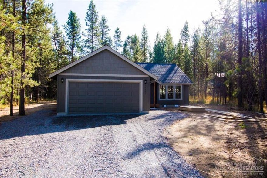 This is a brand new home! The builder builds a quality home with quality materials, so you don't want to miss out on the opportunity to own a new home at a great price. Features include rounded sheet rock corners, tile backsplash in the kitchen and the bathrooms, double sinks in the master bathroom, large utility room, stainless steel kitchen appliances, double car garage with a garage door opener. Oregon Water Wonderland has a boat ramp on the Big Deschutes River for owners to enjoy.