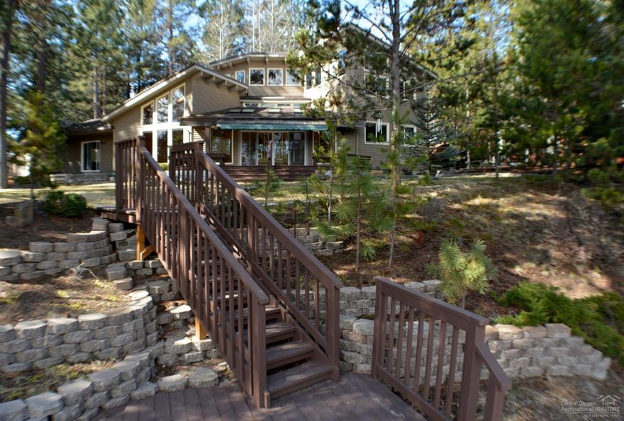 Beautiful Big Deschutes Timber Framed home with Vaulted ceilings throughout sitting on .80 acre of mature ponderosa pines. The kitchen has Granite counter tops, newer appliances, New Tile floors, counter tops and shower in the bathrooms. Wood style floors throughout the kitchen, dining, great room and sunroom with a wall of windows looking out to the river giving you natural light. Master bedroom is on the main level. This home has been beautifully maintained. 2 garage areas with lots of storage