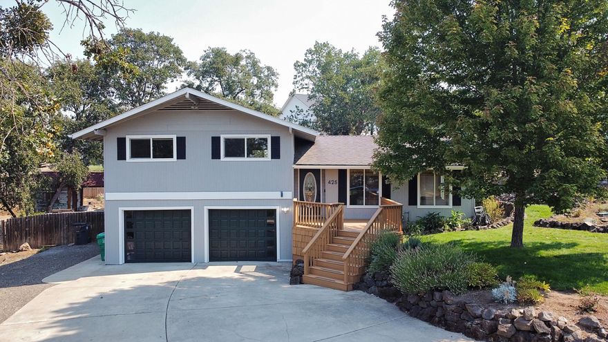 Welcome Home! This 3 bed 2 1/2 bath home is filled with great upgrades. And did I mention ready for a new owner. The light and bright atmosphere is complimented by a fresh coat of interior paint, new stainless steel dishwasher, refrigerator and new light fixtures throughout. The bathrooms boast new toilets, mirrors, hardware and sinks. Don't want to have to move your washer/dryer? Even better, the sellers are willing to leave their current ones so you can avoid the hassle. The exterior has also been freshly painted. Enjoy the large .40 acre lot where there's an abundance of new plants and privacy hedges that have been recently planted as well. There is also drip irrigation to the hedges and some other plants so you can relax and not have to worry about watering them.  Whether you like to garden, BBQ or just relax this is the perfect home for it. Seller is including a 1 year Fidelity Home Warranty.