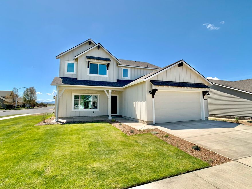 LOT:WB02 - New 2386 SQFT modern farmhouse two level home on a corner lot with fencing and AC included by builder! 4 bedroom 2.5 bath with luxurious primary suite with soaking tub, shower and walk-in closet. Deluxe chef's kitchen with quartz counters, pantry, island, dishwasher and 5 burner stainless air-fry convection built-in gas range. The Thielsen in the desirable Willowbrook neighborhood in Madras OR. Built by award winning builder MonteVista Homes. Great room, loft, 95% high efficiency gas forced air heating, gas fireplace and covered patio. **Save up to $500 a month with builder financing special**