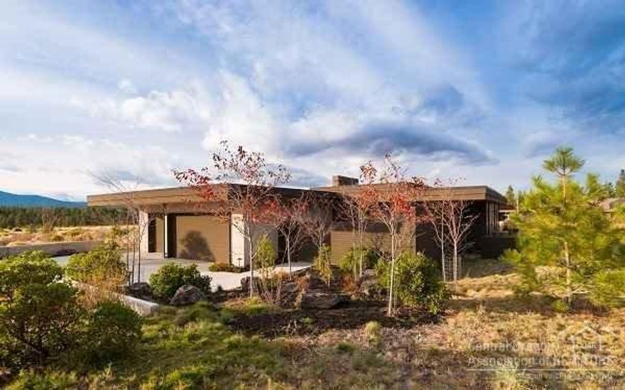 One-of-a-kind architectural gem in highly sought after Shevlin Commons. Single-level living with unobstructed views from the Sister's to Jefferson. Overlooks common area and Shevlin park. Solar panel approved and ready, super-efficient with green features throughout, incredible interior courtyard, triple-car garage with shop area. Fully landscaped with drought tolerants. Outdoor dining with built in BBQ on expansive patio.