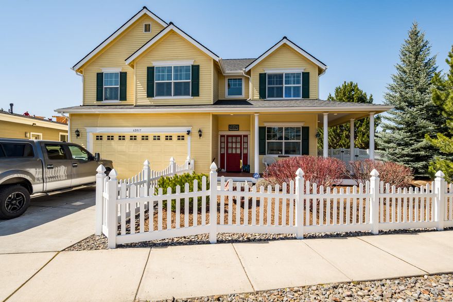 This Home is Spectacular! Custom High Quality Finishes throughout include Gorgeous Walnut Floors, Crown Molding, Custom Kit Cabinets w/Beautiful details, Island w/Hammered Copper Sink, Coffered Ceilings w/Custom Lighting & more! Great Room on the Main Plus an Office; All BR's are Up & a Spacious Family Room w/Mtn Views! Lovely Master Suite w/Travertine Bath. Large landscaped, fenced yard w/Paver Patio & Fire Ring. Central Vac, 2 Zone Heat/AC, Plantation Shutters, Sec System & more. Beautiful Home Inside and Out! New Exterior paint 2016, Super High Efficiency furnace w/humidifier & built in UV light to kill allergens, Media Center w/Speakers throughout home, garage & patio. Gas plumbed on patio for BBQ; drip irrigation front & back, Interior walls are insulated, built-in cabinets in LR & office, Pantry, built-in desk area in kit, under and over counter lighting, and so much more!