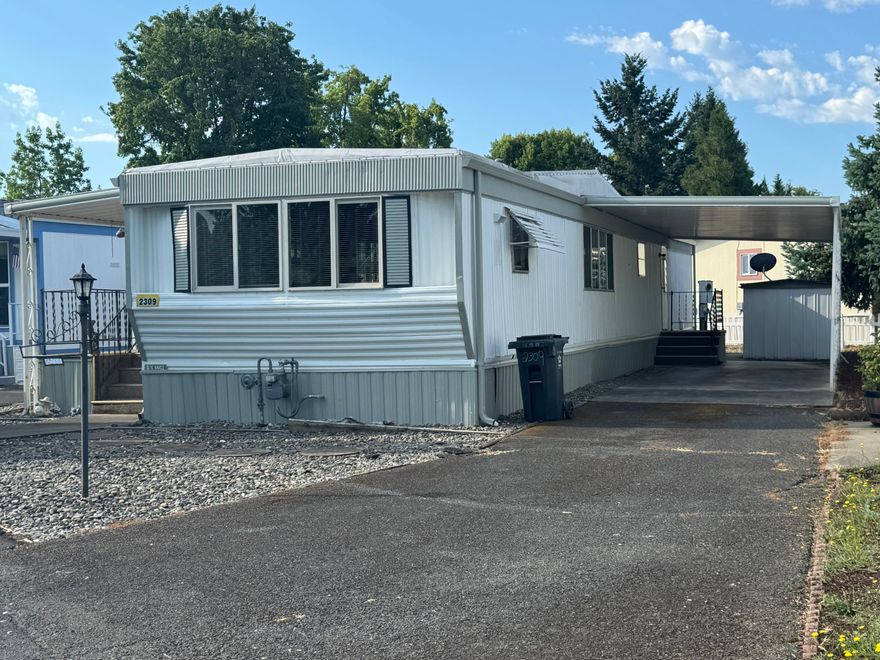 Ideal location right across from the lake and beautifully landscaped walking.  This home offers 900 sq ft with 2 bedrooms and 1 bath.  Open kitchen has ample lighting, views of the lake, and eating bar.  All appliances stay to include refrigerator, dishwasher, washer, and dryer.  
Covered front porch and carport.
Home is move in ready with professionally cleaned carpets.