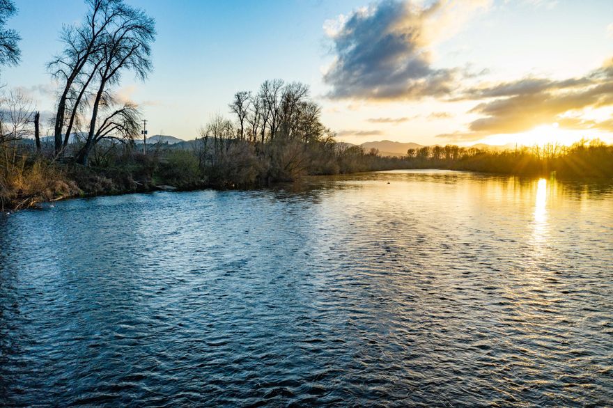 Currently in pear production, this orchard is one of the most productive properties in the region, with a combination of sought-after Rogue River water rights & highly productive loam soils (over 144 acres of Class II). Situated on +/-176 acres with 8 tax lots, this property's shape & level topography aid in efficient farming. Over 3,000 feet of frontage along the renowned Rogue River, & includes its own boat ramp, and campsite. At 880 feet above sea level, the climate is highly sought after with four distinct seasons including a mild winter & a long growing season. This property has vast potential to be transitioned to row crops or other agricultural ventures. The main homesite is secured by a single-wide manufactured home. Whitehorse Park adjoins the property on the west side & provides access to an additional 5,000 feet of river frontage for recreation. Properties of this size, combined with the river frontage, soils, & water rights, are rarely available in the region.