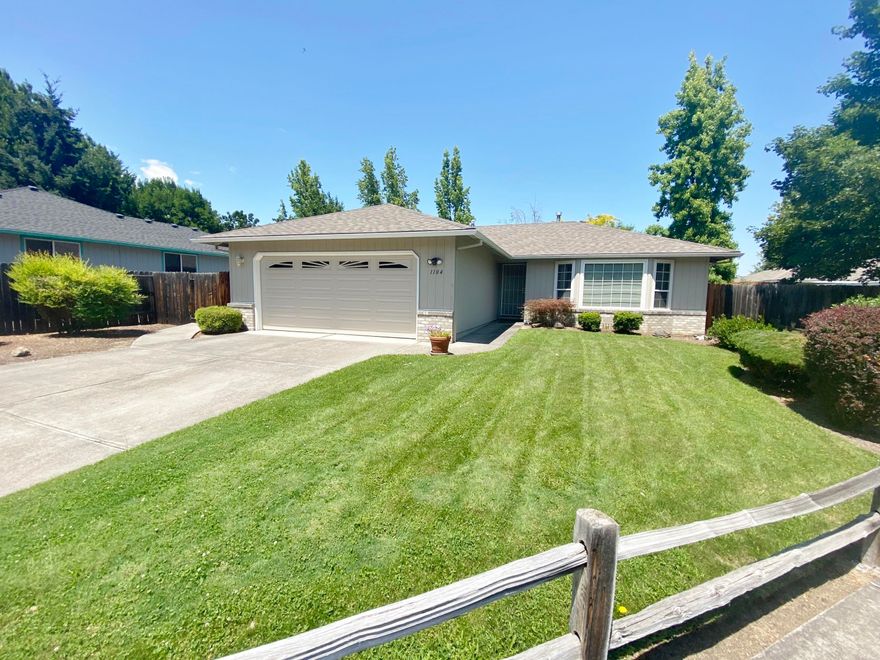 Do not miss our on this 3 bedroom 2 bath DeCarlow built home.  This home has a nice floorplan with Kitchen, Dining area and Living room all connected.  The Kitchen has ample counter space and the Living Room is good size with a natural gas fireplace and a coffered ceiling. There are hardwood floors in the entry and newer carpet throughout the rest of the home. The Master bedroom is large with a nice sized walk in closet and lots of natural light.  The home also has an indoor laundry room. The home also had a new roof installed a couple years ago.  The grounds are nicely landscaped with automatic sprinklers for the front and back.  There is a nice patio in the backyard that is accessed off of the Dining area. Do not miss out on this nice home in a good location.