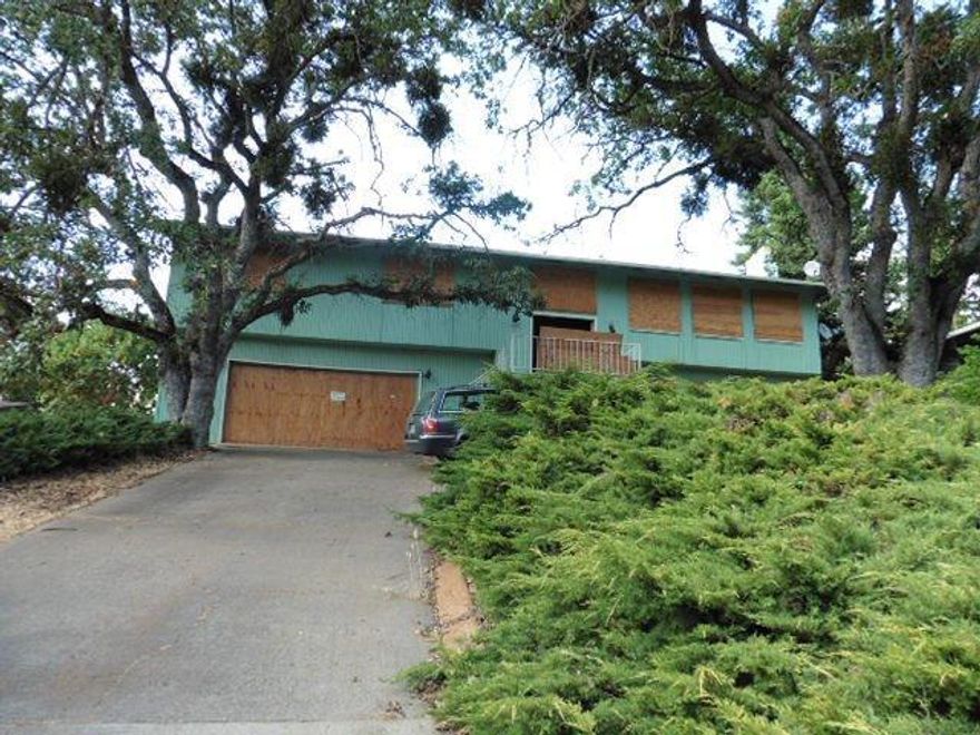 Large sq ft home across the street from the park situated on a large lot with a nice deck in back. Split level floor plan offers large living room and 4 bedrooms and 2 bathrooms on main/upper level as well as a large bonus area, laundry room and additional bathroom on the lower level.