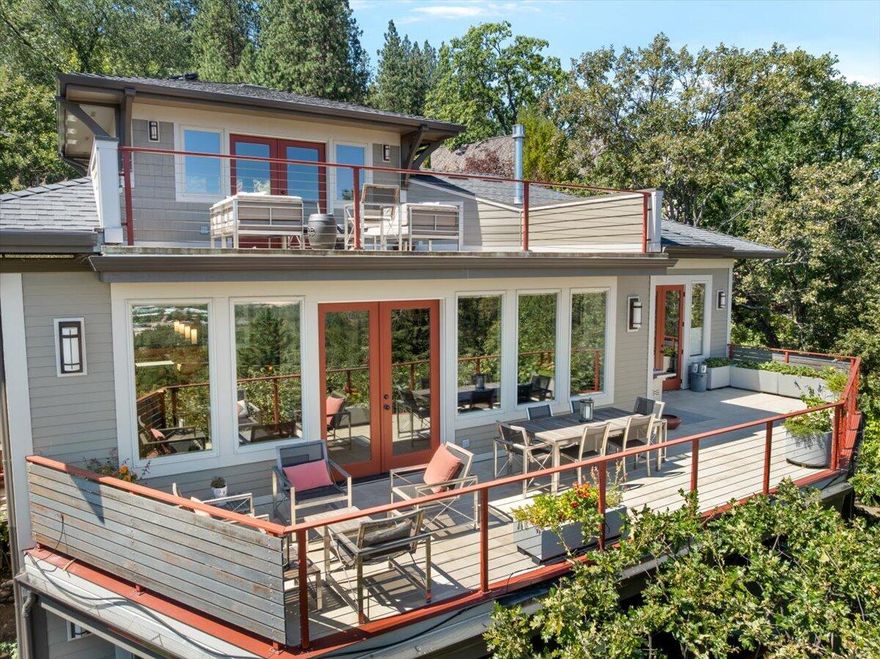 Experience the best of Craftsman charm and modern living in this stunning home. Situated on a private cul-de-sac, this residence offers a serene escape with great views from multiple vantage points. 
The open floor plan creates a seamless flow between the living room, dining area, and a gourmet kitchen. The kitchen is a chef's dream, featuring high-end stainless steel appliances and a sleek induction range.
The home boasts a generous primary bedroom with an ensuite bath, providing a luxurious retreat. A comfortable guest room ensures visitors feel right at home. The third room, currently used as an office, can easily be converted back into a bedroom to suit your needs.
Upstairs, you'll find an incredible TV/hang out room with a wonderful viewing deck perfect for enjoying the scenery and a dedicated TV room for movie nights or relaxing. This home is completely move-in ready, offering a perfect blend of privacy, functionality, and style.