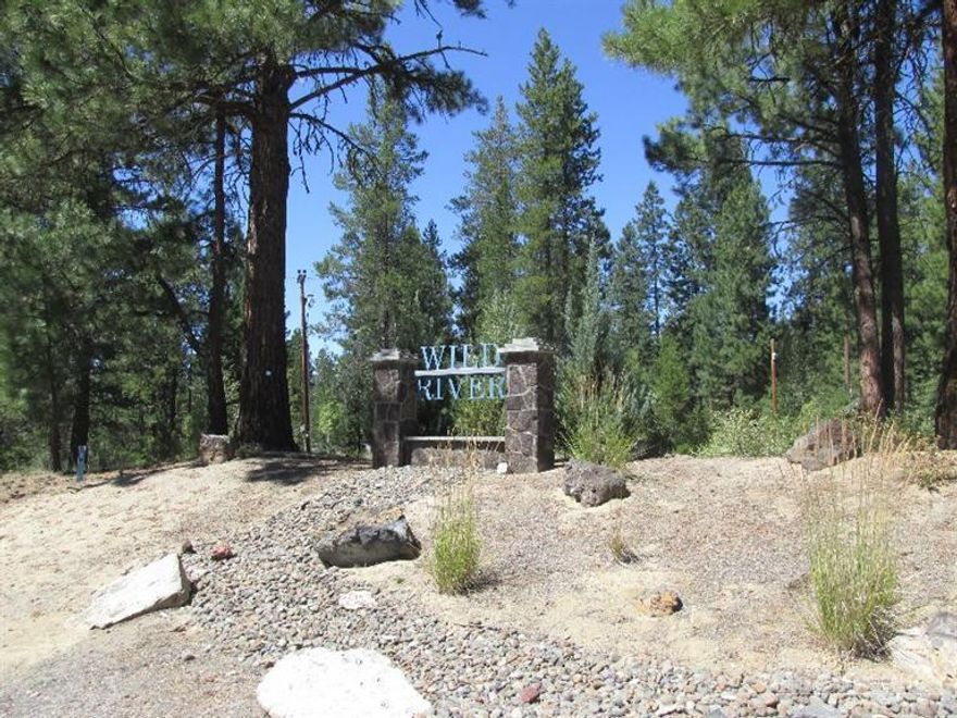 Beautifully treed corner lot, backs to common area & adjacent lot is also available, 14367 Brown Trout, which has septic installed. Buy both for almost 0.80 acre. Wild River is a beautiful area of upscale homes w/ the Deschutes River running through it at Pringle Falls. Scenic trails, native terrain & a footbridge across the rapids of the river! Pristine setting w/ underground utilities & paved roads.