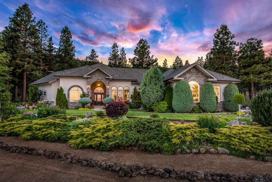 The High Line Ranch!!!  Move In ready in a Park Like Setting.  This is the Gentleman's Ranch that boasts clean fresh air, 85.93 acres surrounding the home, 34 lush irrigated pastures in the front  and stunning establish Ponderosa Pine Pine Trees behind. The main home is meticulously designed Mediterranean Style.  Perfectly taken care of, it  possess Dramatic Stone and Dark Cherry Wood, Beveled Cut Glass front door, 14' ceilings, 8' foot doors, crown moldings, chair railings and beautiful French Doors.  The seller did not spare any expense when designing and installing top of the line quality  products in this home. Private covered patio, elaborate formal dining and living rooms as well as an outstanding open kitchen.  The kitchen has a prep island, eating bar and opens up to a living space with Peninsula fireplace.  Don't miss this opportunity to purchase one of the finest homes, where the air is fresh, the people are kind, and their is plenty of room.