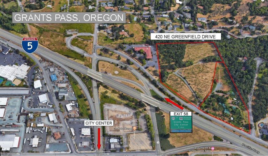 Prime Interstate-5 Interchange Location -13.03 acres zoned general commercial. High visibility from Interstate-5, easy access to Exit 58 & NE Grants Pass. The General Commercial Zone provides for all commercial & professional uses, except those uses requiring on-site manufacture or assembly. Purchase includes 2 tax lots, 9.76 & 3.27 acres - both zoned General Commercial and over 3,500' sq. ft. of as-is historical improvements that offer a wide range of potential uses. Public sewer main crosses the property and a city water main is located at adjacent property. Hotel, restaurant, office, retail, strip mall, sales lot, & big box store are just a few of the many uses for this exceptional development site. Owner financing available to qualified buyers which will allow new owner to secure a prime commercial location for future use, use capitol to develop the site, & establish revenue.