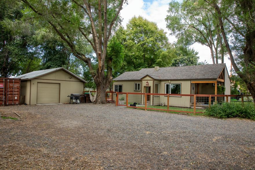 Welcome home to ''Rancho Relaxo'' your oasis on the Ochoco Creek in Prineville. Private creek frontage in your own backyard! Spend your summers fishing,
swimming & enjoying your own water front property. Home is on 2 taxlots w/.36 of an acre w/huge trees & park like setting w/garden, green space. This
home has been very well taken care of w/laminate flooring, updated berber carpet, remodeled bathroom w/slate walk-in shower, newly installed mini-splits in living room &
bedrooms. Newly added addition off the primary to include a new bathroom w/vaulted ceilings, shower, LVP flooring & storage. Off the living room, enjoy your new,
covered porch to enjoy your morning coffee & listen to the birds chirp. Kitchen has gas stove, tile counters & eat in dinging room w/barnwood accents. Outside enjoy your
detached shop/garage where you can work on projects or park your toys. Walking distance to Wild Ride Brewery, grocery stores, schools & the new
hospital. This property has so much to offer