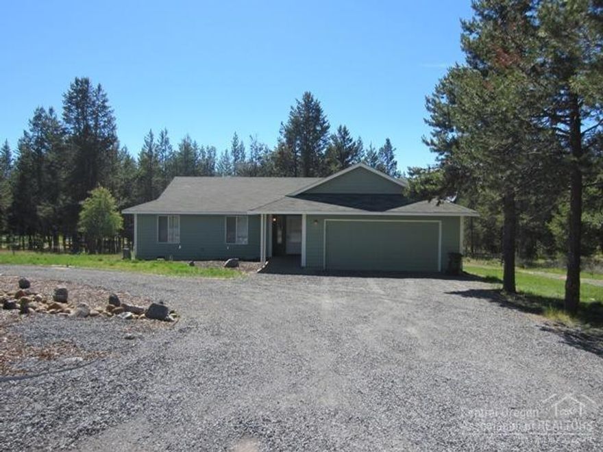 Super oppty for an income producing nightly,weekly rental or permanent residence. This super clean single level home on 1.22 acres is located on a paved road and just 8 minutes to Sunriver Mall. Numerous updates include: plumbing,floors,toilets,sinks,faucets,vanities,lighting,doors. Gas frplce heats this house w/little effort. Full landscaping w/sprnklr system. 24x36 metal SHOP with 12x12 door,concrete floor, sheet rocked & 30 amp RV plug. Circular drive and easy access into the shop.