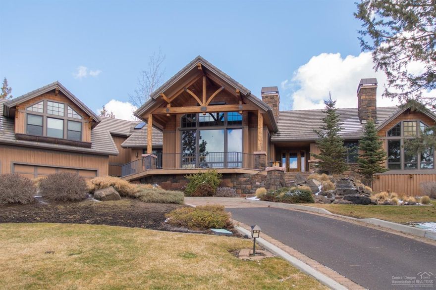 Custom-built by Norman Building & Design! Amazing lodge-style on 1.17 acres with Cascade Mtn views in desirable Awbrey Butte location. Spacious great room plan w/custom carved timber poles & beautiful stone fireplace. Large kitchen w/breakfast nook & lots of natural light. Great separation between beautiful master suite & 2 additional guest suites. Brazilian cherry hardwood floors, slab granite & lots of other hi-end finishes. Incredible landscaping w/water feature, greenhouse, storage shed & paver patio.