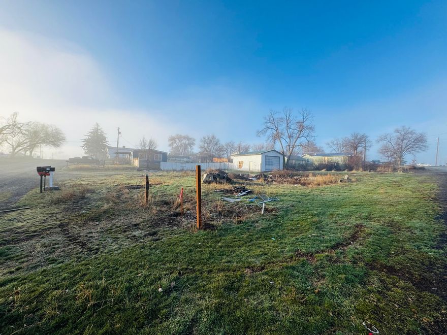 .26 acres in town double lot featuring a 28x38 shop, offering ample space for development. Zoning and lot size allow potential for a triplex or four Plex, or build your custom home with ADU was still enjoying generous space. Previous home was burnt down. SDC credit due to home that burnt down check with the city for additional information.