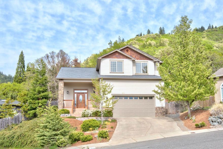 Enjoy city views from your front porch! Located in a desirable NE Grants Pass neighborhood close to all the conveniences of town.  Featuring a 3 bedroom, 2.5 bathroom home built in 2005 with 1,871 s.f. and an attached two car garage.  Including an open floor plan, living room with high vaulted ceiling, new carpet and slider leading to private covered patio. Spacious kitchen with ample counter space & island, granite counters, pantry and stainless steel appliances.  Master bedroom w/ en-suite bathroom, walk-in closet, full guest bathroom with two additional bedrooms upstairs.  Beautifully landscaped with fenced backyard including room to garden and deck great for entertaining or soaking in those Southern Oregon sunsets.  All this with energy efficient gas heat, central air, set on a cul-de-sac close to shopping, restaurants, schools and more.  Call and schedule your tour today!