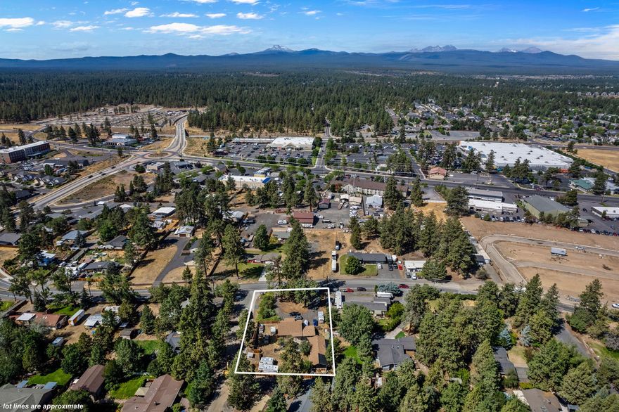 This property features a 1,600 sq ft occupied home, currently included in the sale.  The seller is offering this as a future development lot with exciting potential. The City of Bend has discussed with the seller's representative the possibility of dividing this lot into two parcels, ideal for multi-family new construction. Sewer is available at lot. Detailed information from the City of Bend meetings, as well as the survey conducted by CA Rowles Engineering, are available in the attachments. For further details, have your Realtor access these documents. Please respect the owner's privacy—viewings by appointment only.