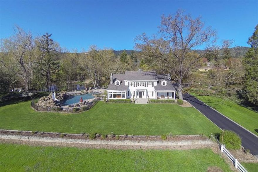 Classic Estate w/Modern Updates! Historic 1915 Frank Clark. Gated, 5.07 Irrigated acres. Vineyard potential or Multi-family potential? 5 bdrm, 3.5 baths, 4638 sqft. 6 fireplaces, wood, Carrara Marble/stone & tile floors, crown moldings, wainscoting. Grand living rm w/ French Doors.Open railing staircase w/ 2nd staircase to back of home leads to a great bdrm plus hallway wet bar w/ granite. Stunning master w/ 2 walk in closets, sitting area, fireplace, marble floors & counters, lg marble & tile shower w/ duel heads & sitting area, soaking tub & dbl sinks.Gourmet chef's kitchen lg island, Koa wood cabinets, dbl ovens, Viking 6 burner cooktop w/ filler pot & butlers pantry.Boxed beam Library w/ hand carved wood bookcase, built ins & moldings.Sunroom w/ lg windows & fireplace. Lg basement w/ wine cellar & attic areas not incl in sq ft.Pond w/ dock.Lagoon style pool w/ beach entry & waterfalls.3 stall barn & tack rm in pasture w/possibility to subdivide.2 car garage plus shop & storage rms