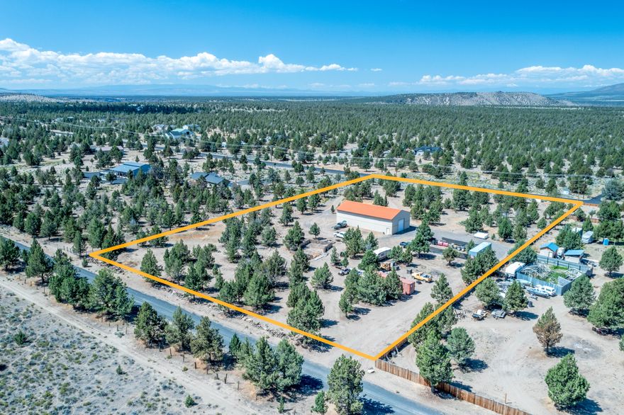 Perfect Prineville Property on 5 Acres with 3,200 SF Shop - Build Your Dream Home or Vacation Getaway. This exceptional 5-acre property in Prineville offers the perfect blend of space, utility, and potential. Featuring a massive 40x80 shop (3,200 sq ft) with a thickened edge slab and 400 AMP electric service, it's ideal for storing all your toys, running a business, or supporting your future dream home.
Located just minutes from downtown Prineville and the beautiful Prineville Reservoir, this property is fully equipped with power, septic, and a shared well already in place—giving you a head start on building your primary residence, vacation retreat, or recreational basecamp.
With dual access including an entrance from the east end, coming and going is easy—whether you're hauling equipment or heading to the lake. The shop offers serious functionality, and the level 5-acre lot gives you plenty of space to expand or build exactly what you envision.