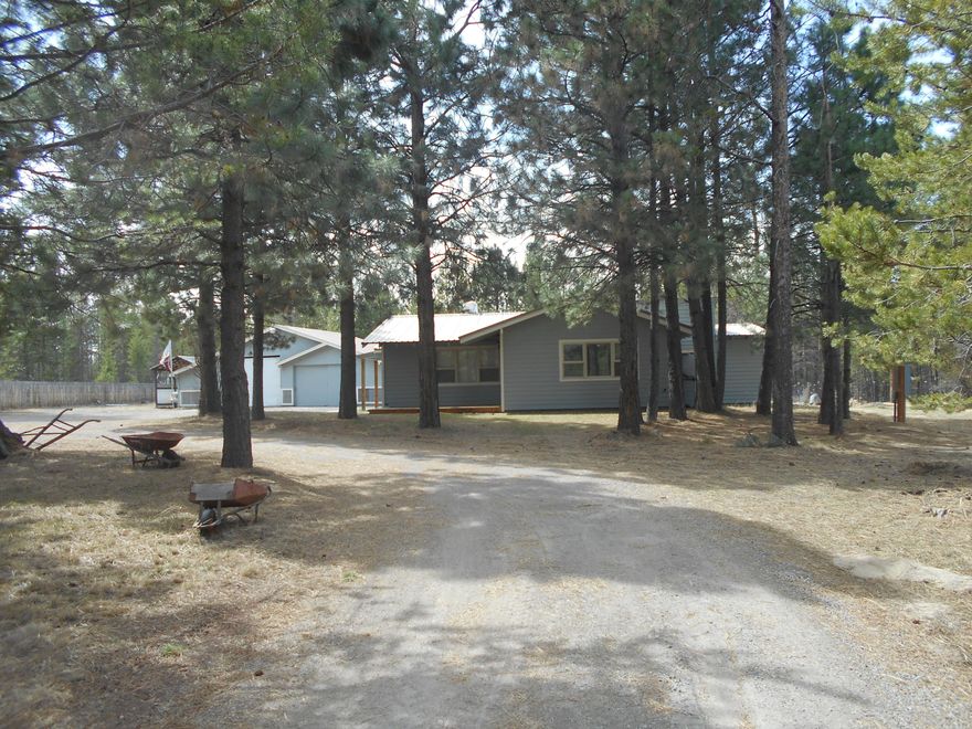 Solid stick-built home on 1.14 acres. Open bright floor plan with large kitchen. Custom finishes through-out. Fully fenced and gated. Certified wood-stove. Newer concrete septic. Metal roof on home and shop. Circular driveway.